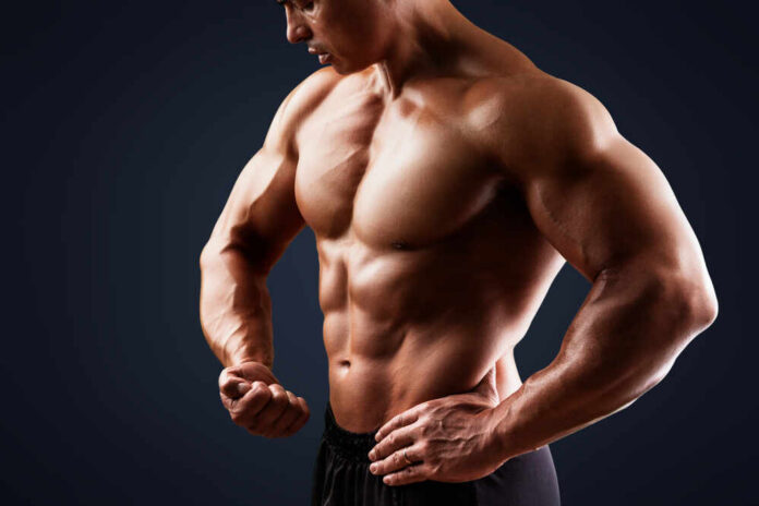 Handsome,Muscular,Man,Posing,And,Flexing,Muscles