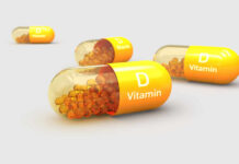 Vitamin D Pills Speed Cognitive Decline? Vitamin D capsules with orange beads inside
