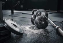 Gym Injuries? Avoid Them with This Trick Kettlebells and weights on a gym floor with chalk dust