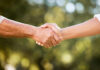 HANDSHAKES: The Startling Depression Predictor Two hands shaking in a gesture of agreement