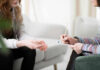 Mental Health – Grocery List Hack! Two individuals engaged in a counseling session, one taking notes