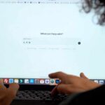 The Blue Light Benefit Nobody Mentions Person interacting with a computer screen displaying a chatbot interface