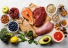 High-Protein Trap Splits Nutrition scientists Assorted healthy foods with salmon, beef, chicken, fruits, vegetables, nuts, and grains