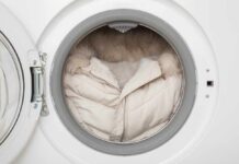 A winter coat inside a washing machine drum