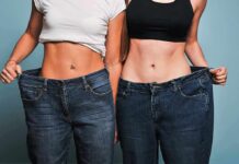 Two women showing loose jeans at the waist