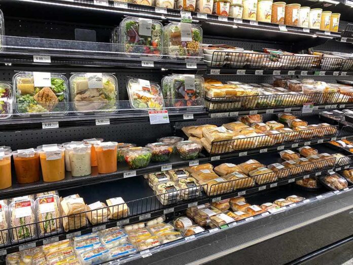 shutterstock_1747572197 Grocery store refrigerated case with prepared foods