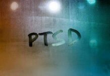 Nightmares: PTSD’s Most Ignored Crisis Condensation on glass with PTSD written in the moisture