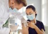 GLP-1 Hangover: Weight Rebound WARNING After Jabs Healthcare worker giving a masked patient a vaccine in the upper arm
