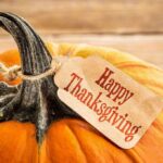 Pumpkin with a Happy Thanksgiving tag