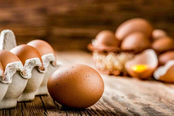 1783890457059-d84aqp-shutterstock-1006671310 Brown eggs on rustic wooden table