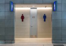 Every Urine Color and What It Actually Means Public restroom entrance with male and female symbols