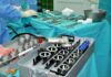 Surgical instruments and implants on a covered operating table