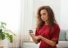 Pre Diabetes? How To Stop It From Progressing Woman using a blood glucose meter at home