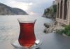 Tea Drinkers’ Survival Edge Stuns Scientists Glass of tea on a saucer by the seaside