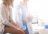 Doctor consulting with patient in clinic