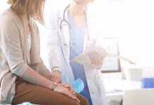 Doctor consulting with patient in clinic