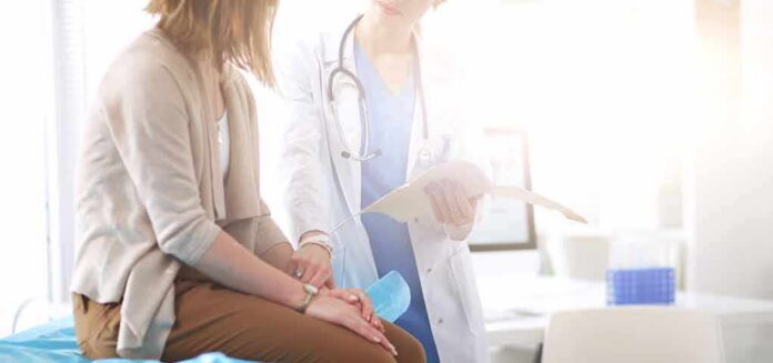 Doctor consulting with patient in clinic