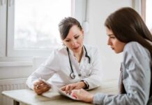 New Menopause Syndrome Shocks Orthopedics Doctor consulting a patient at a desk